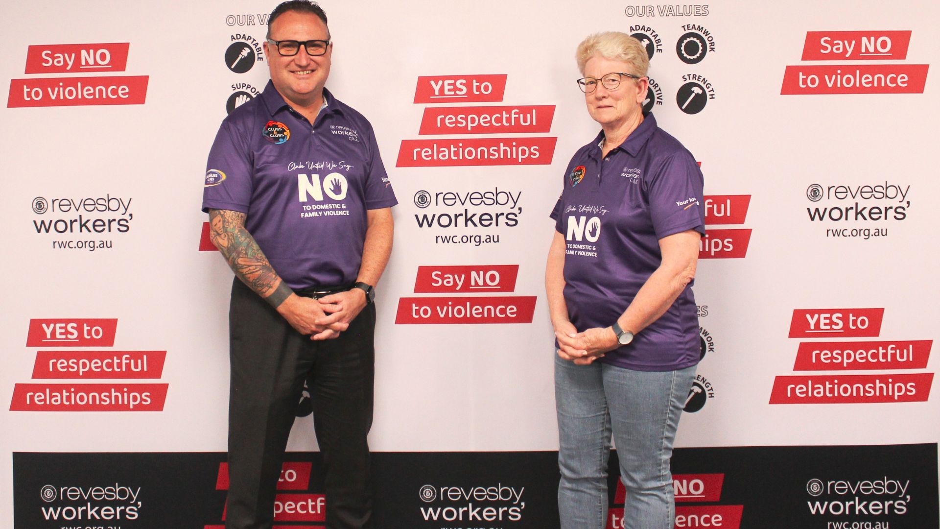 Man and woman wearing Purple shirts
