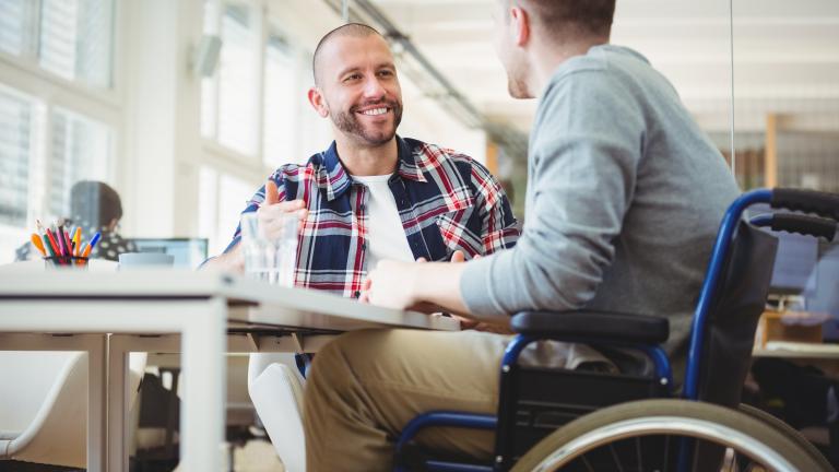 Man in wheelchair meeting