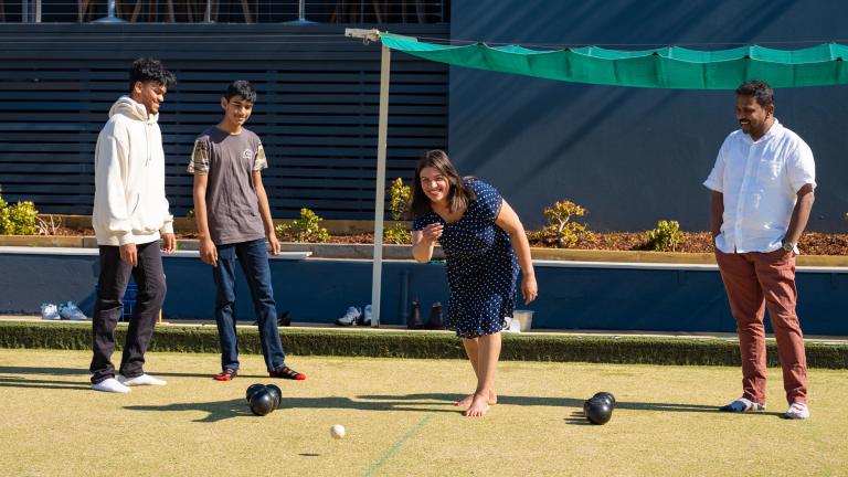 People playing bowls