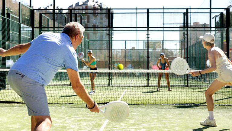 People playing paddle tennis