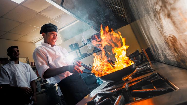 young chef cooking