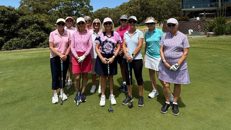 Lady golfers on green