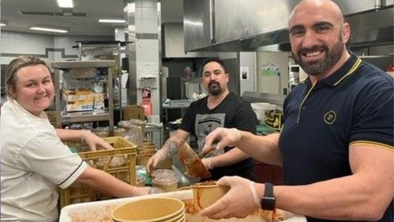 tim mannah pouring soup into a bowl