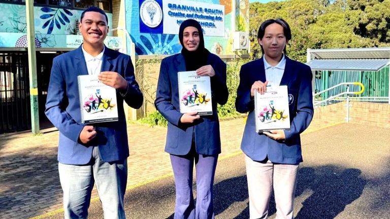 students holding certfificates