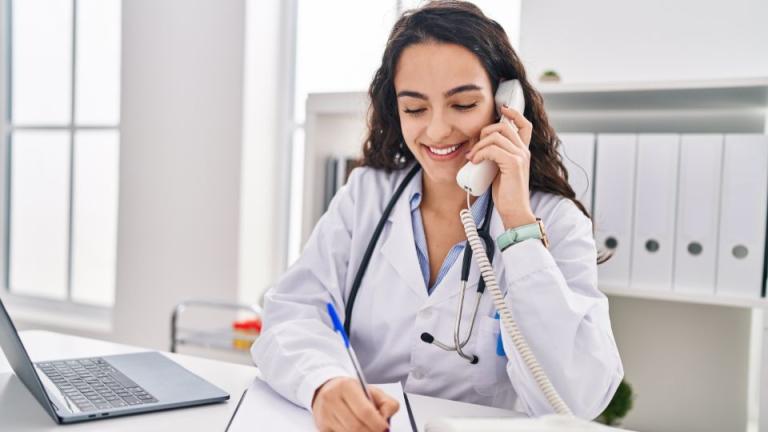 doctor using telephone