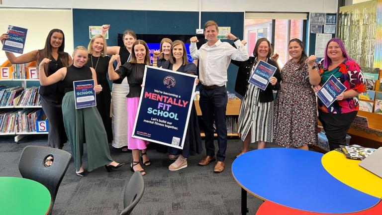 teachers holding certificates